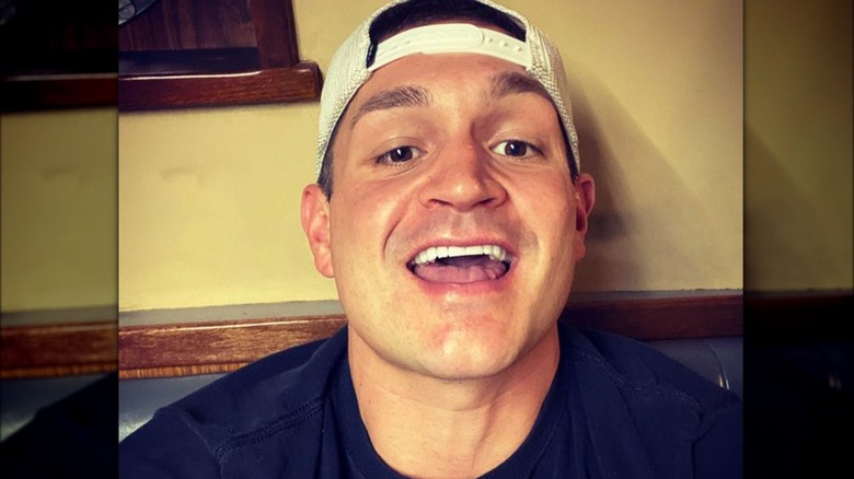 nick mcglashan laughing backwards cap