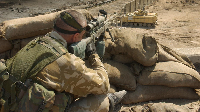 Sniper sighting a target in Iraq