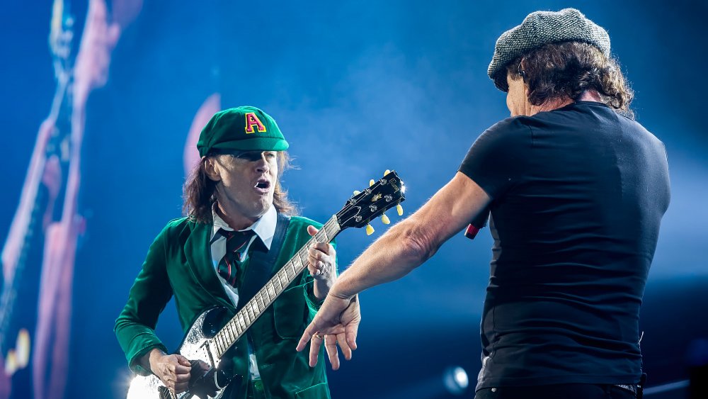 Angus Young and Brian Johnson of AC/DC performing live