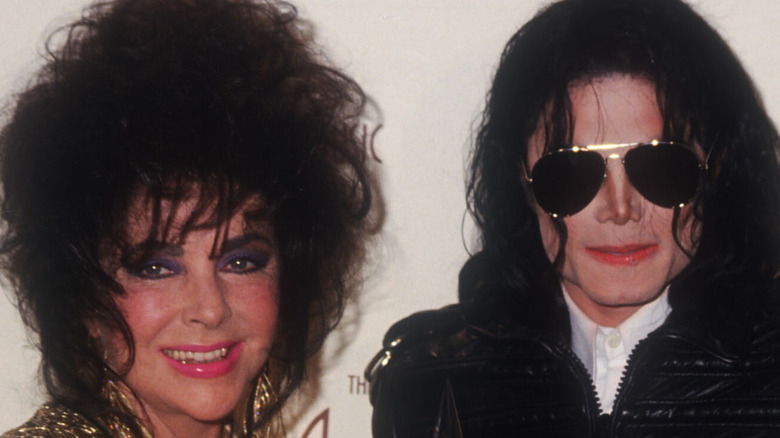 Elizabeth Taylor with Michael Jackson smiling