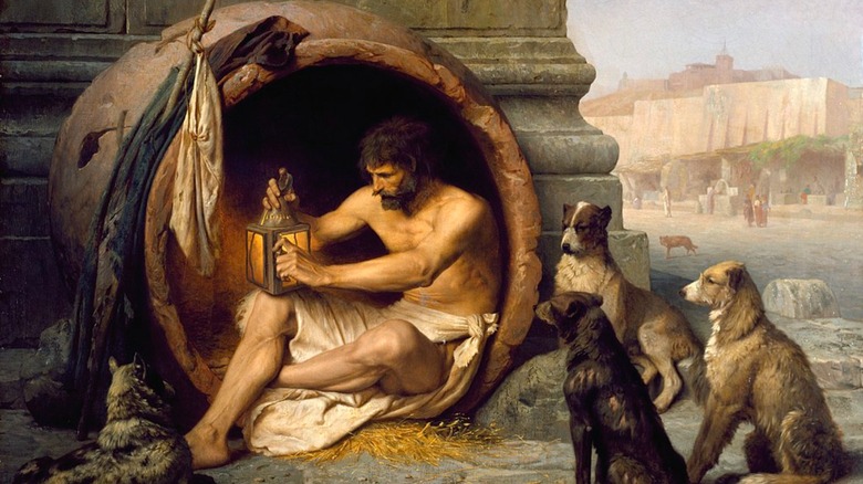 Giogenes in barrel with dogs