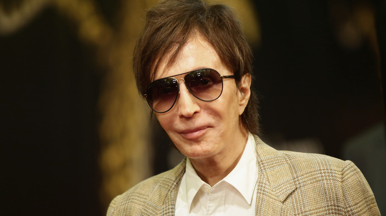 A shaded Michael Cimino looks up