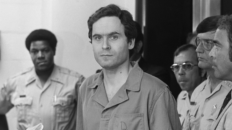 Ted Bundy surrounded by security