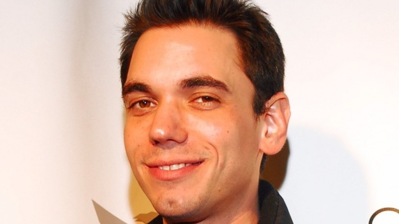 DJ AM smiling