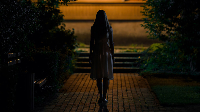 Woman at night