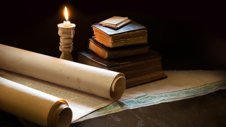 Old books and a scroll