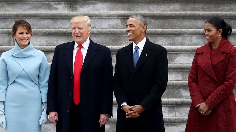 Trumps and Obamas standing together