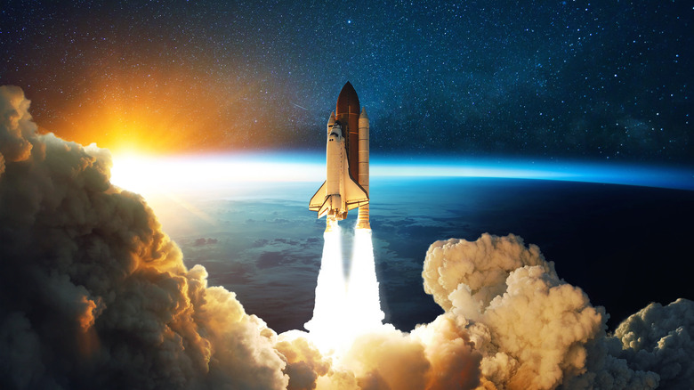 Space shuttle leaving Earth