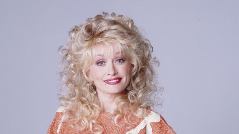 Dolly Parton posing for a portrait 1989