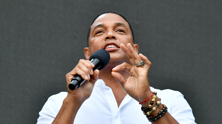Don Lemon speaks in mic at event
