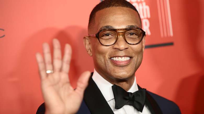 Don Lemon waves on red carpet