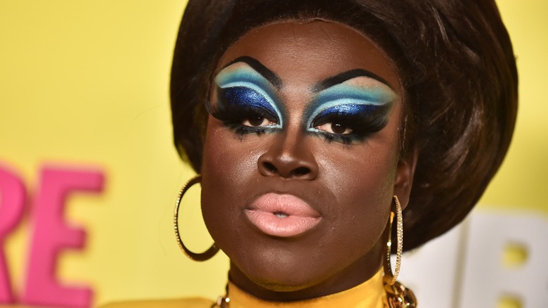 Bob the Drag queen yellow backdrop