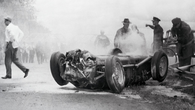Bill Vukovich's car burning on the speedway