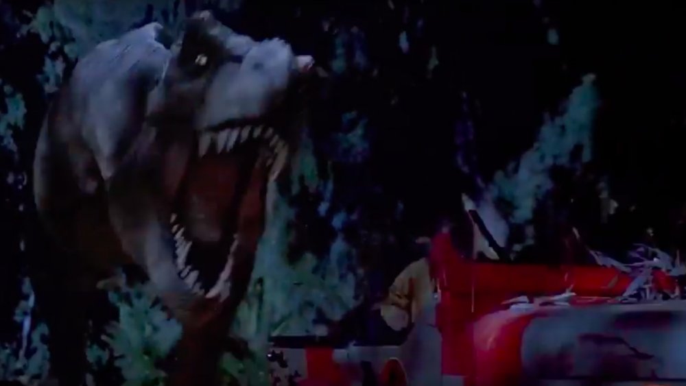 T-rex chasing a jeep