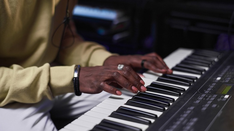 Man playing on keyboard