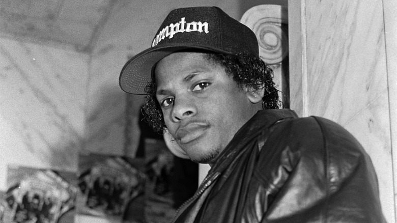 Eazy-E donning Compton cap