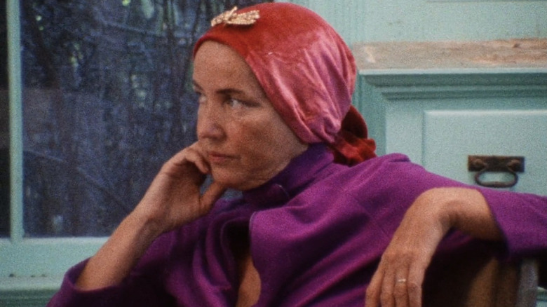 Edith Bouvier Beale seated, hand on chin