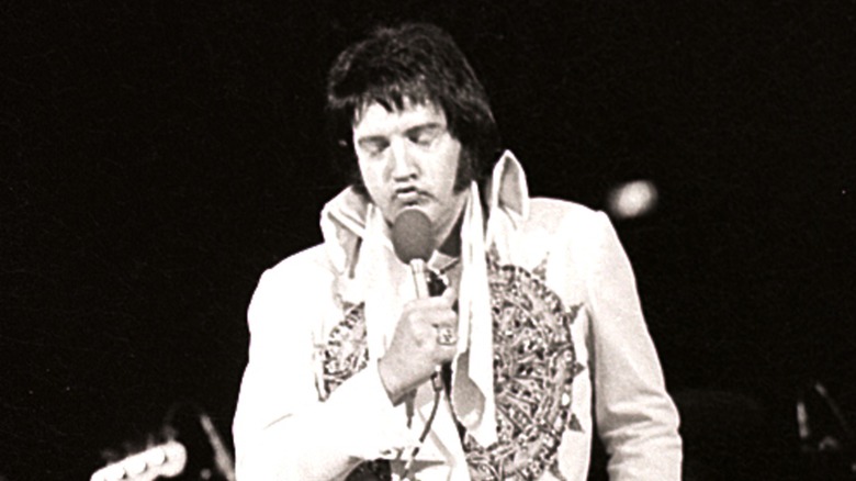 Elvis Presley performing in 1977