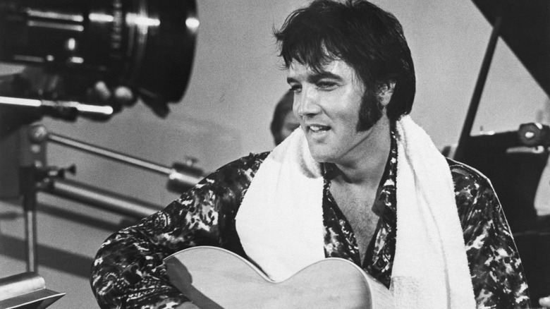Elvis Presley with acoustic guitar