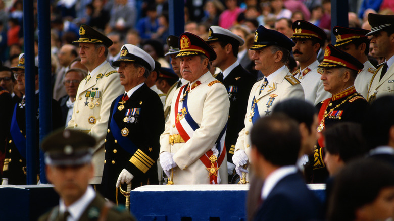 Augusto Pinochet attending a military event days after his assassination attempt