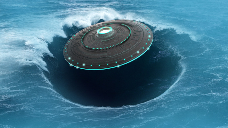 A UFO hovers over the ocean