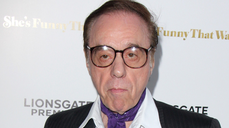 Peter Bogdanovich in scarf and glasses
