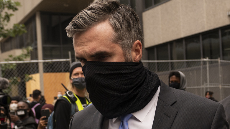 Thomas Lane exits the courtroom