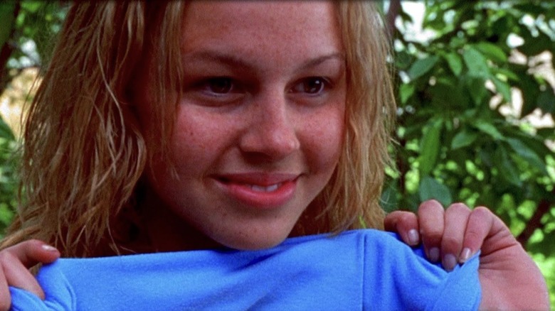young Aileen smiling
