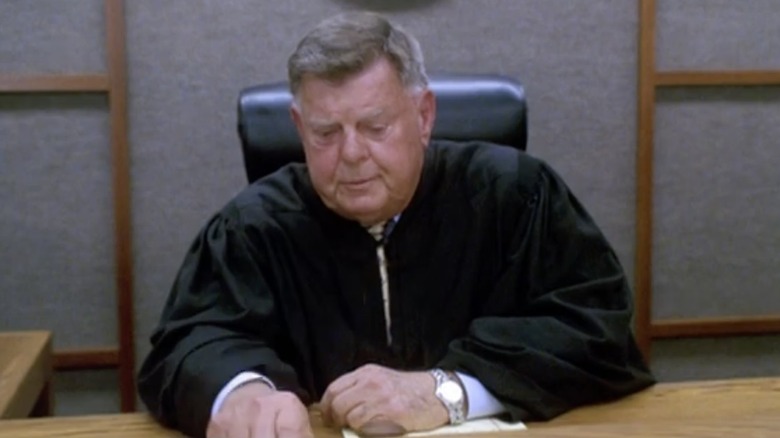 Judge looks down
