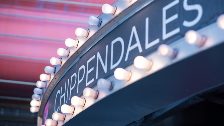 Chippendales sign surrounded by lights