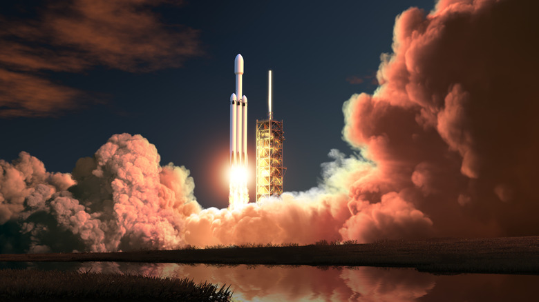 A rocket taking off at night