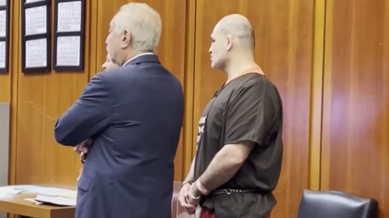 Cain Velasquez and defense team at pre-trial hearing