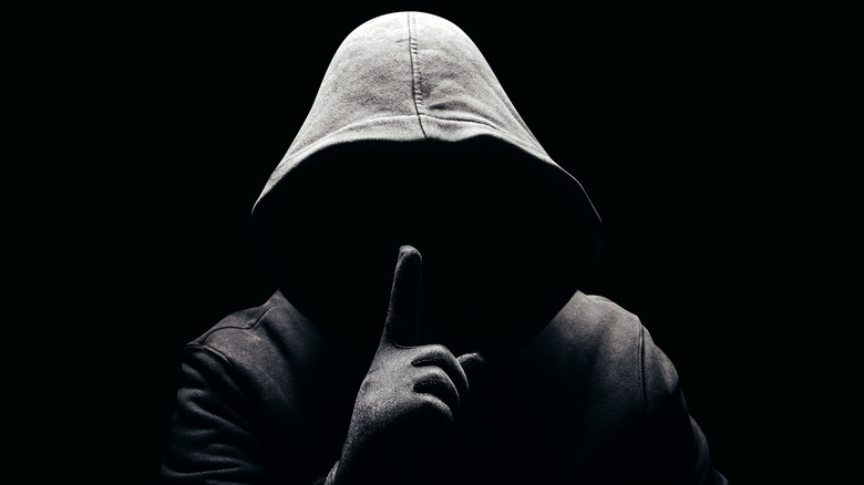 Stalker whispering from shadows