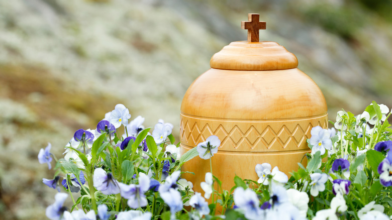 Cremation urn and flowers