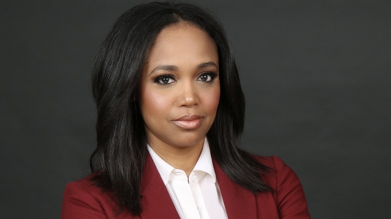 Faith Jenkins in a red jacket