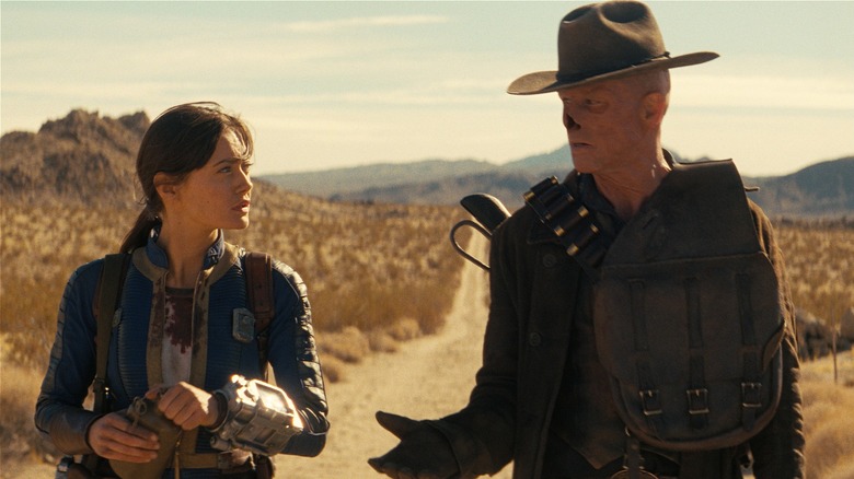 Marty Robbins smiling on stage in western wear