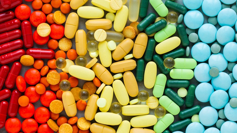 rainbow colored pile of pills
