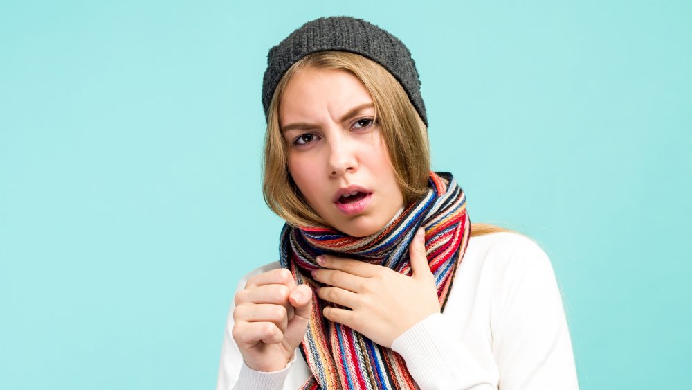 woman coughing, pandemic