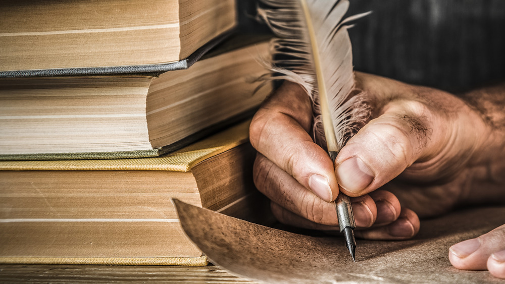 Man writing letter.