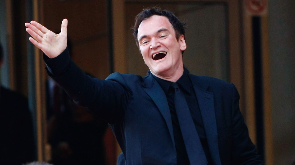 Quentin Tarantino waving