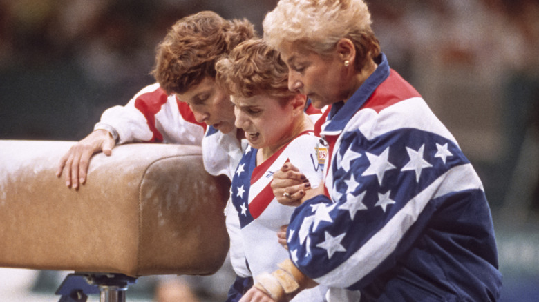 Keri Strug with coaches