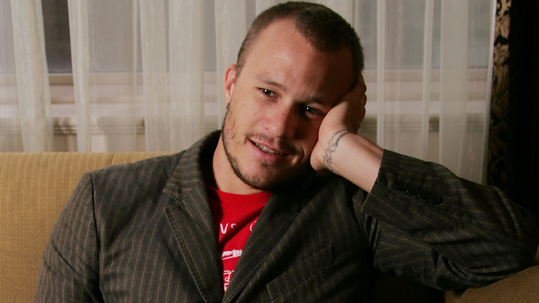 Heath Ledger resting hand on face