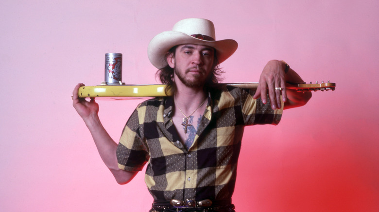 Stevie Ray Vaughan looking cool with his guitar
