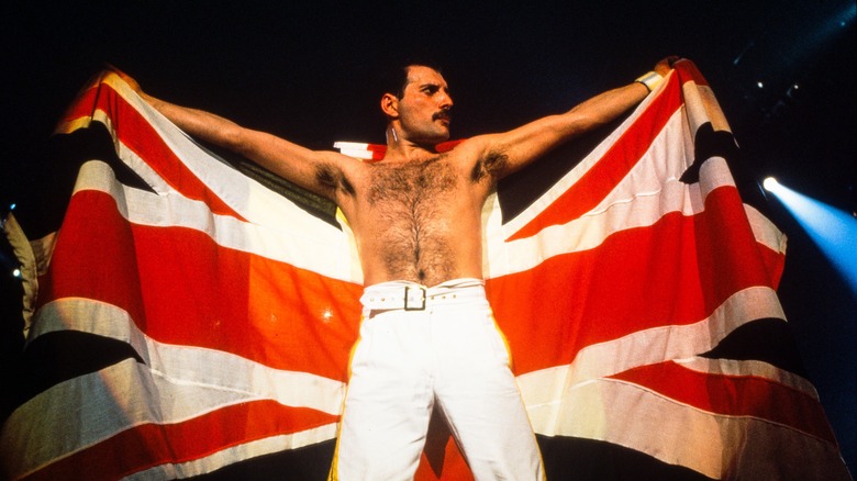 Freddie Mercury in stage with a union jack