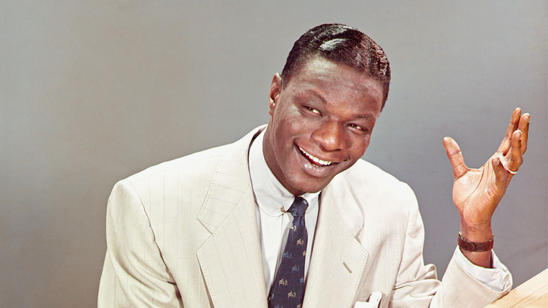 Nat King Cole sitting at a piano - Fact Check: Famous Celebrities Who Died In Their 40s
