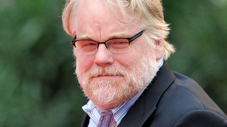 Philip Seymour Hoffman wearing glasses