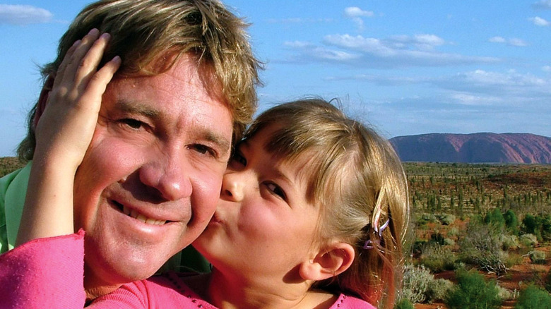 Steve Irwin with his daughter in Australia