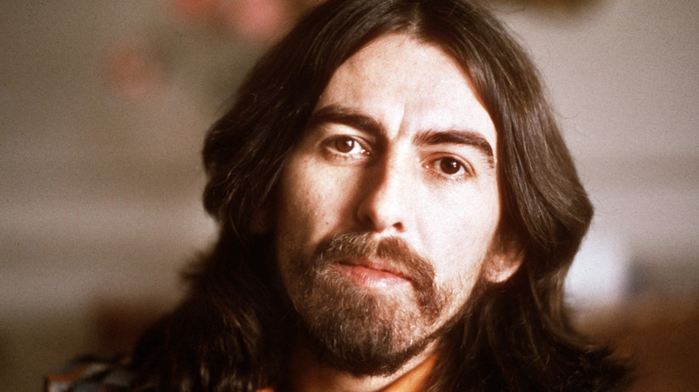George Harrison tilts his head