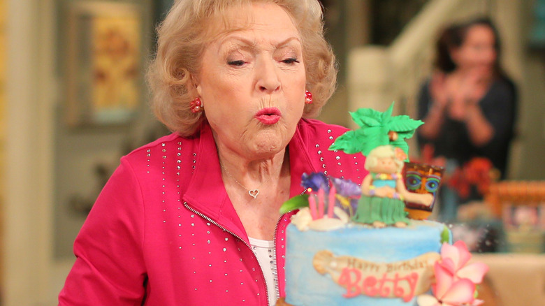 Betty White celebrating a birthday on set