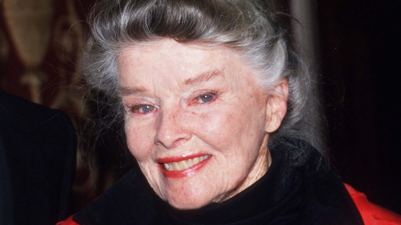 Katharine Hepburn at an event with tony curtis